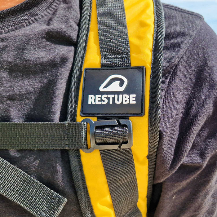 Backpack straps for swim buoy by RESTUBE